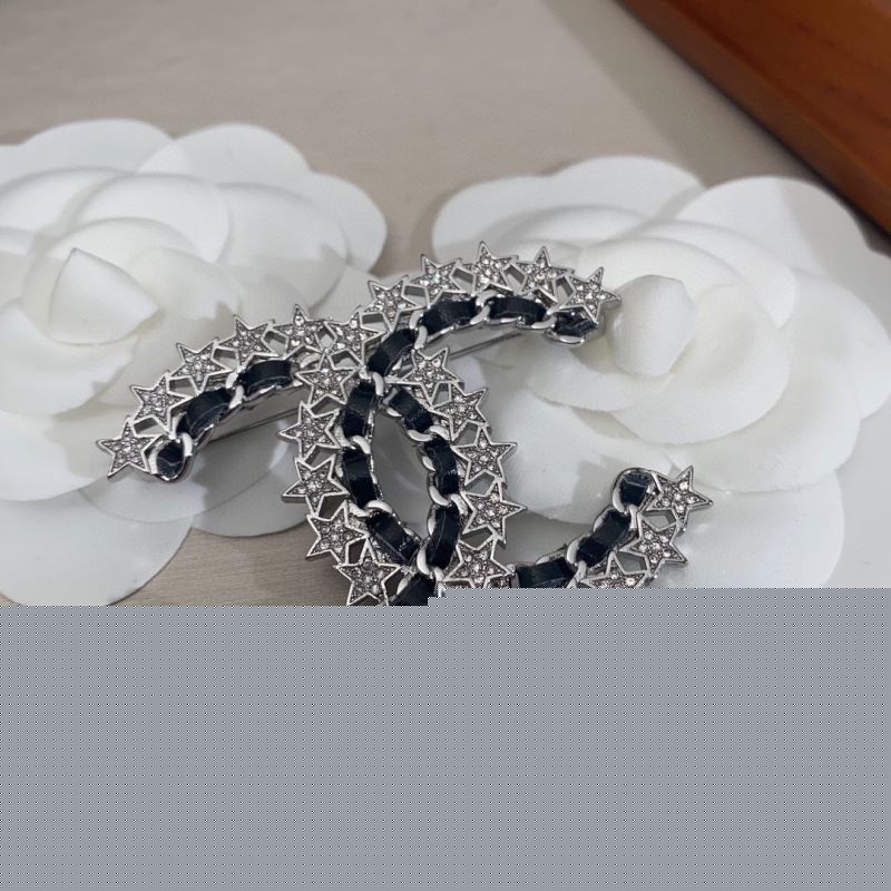 Ch*el brooches